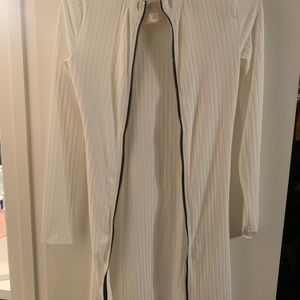 So plush boutique size large be used as a cover for swimwear dress zips up